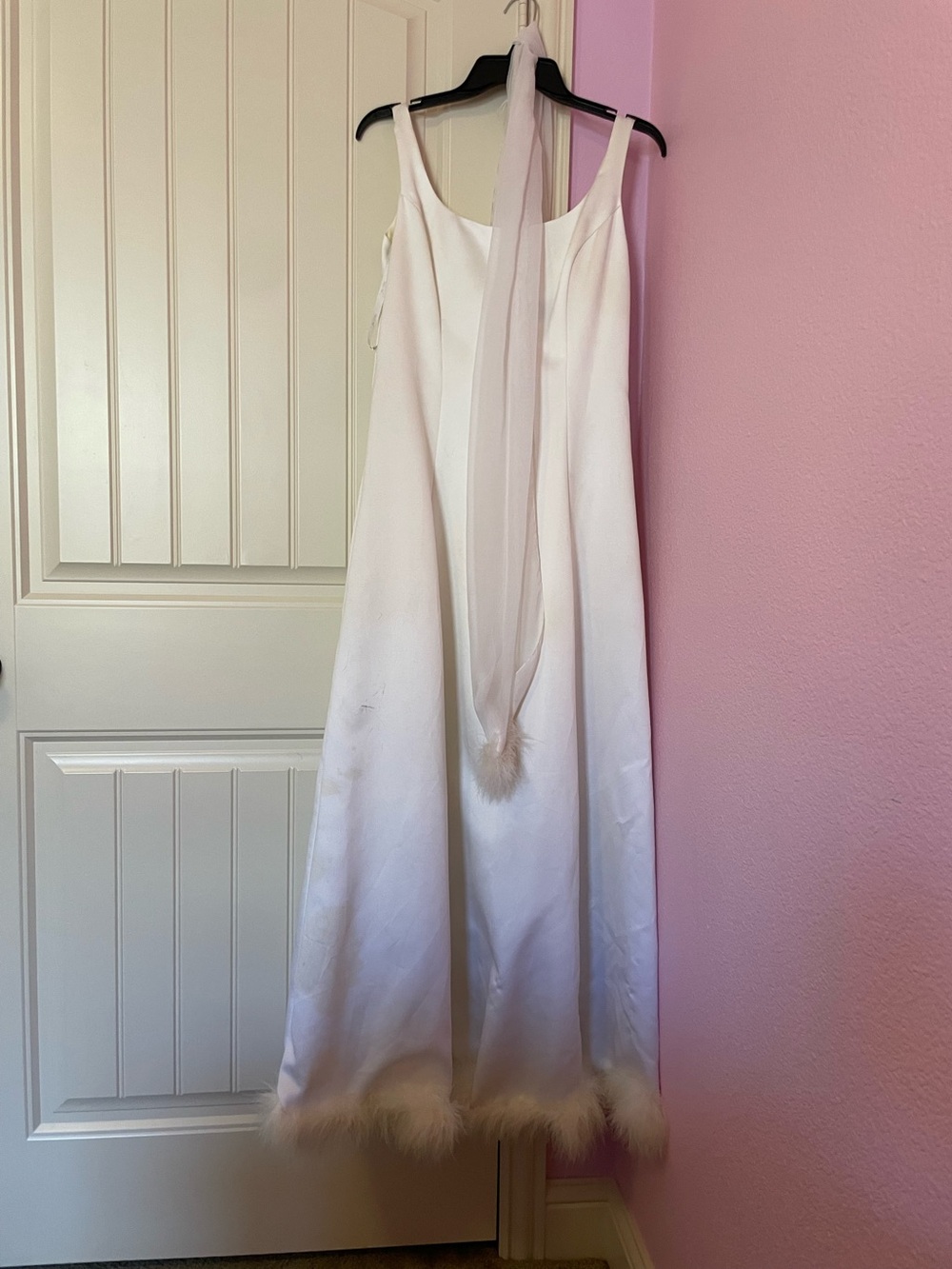 White Satin Evening Slip Dress with Feather Trim and neck drape.